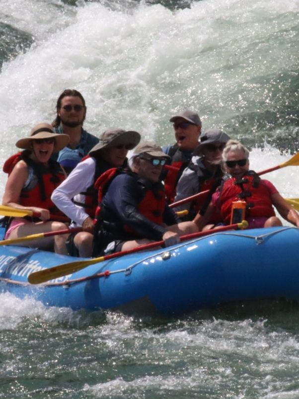 A raft crew hitting whitewater on the Deschutes River in Oregon